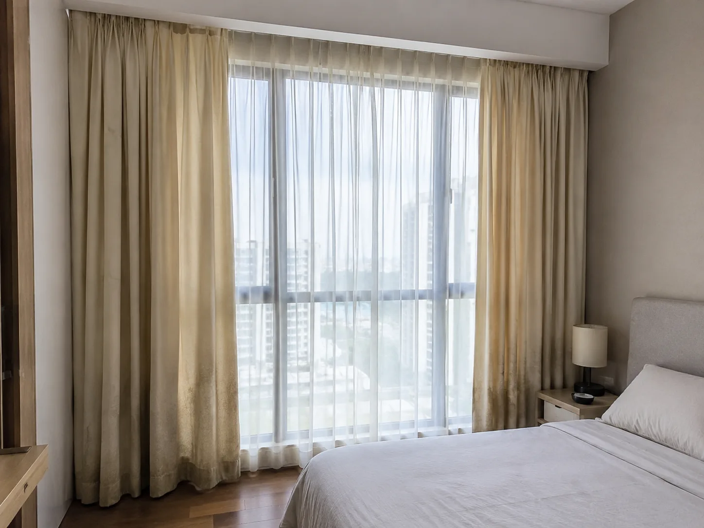 Bedroom curtains before professional cleaning