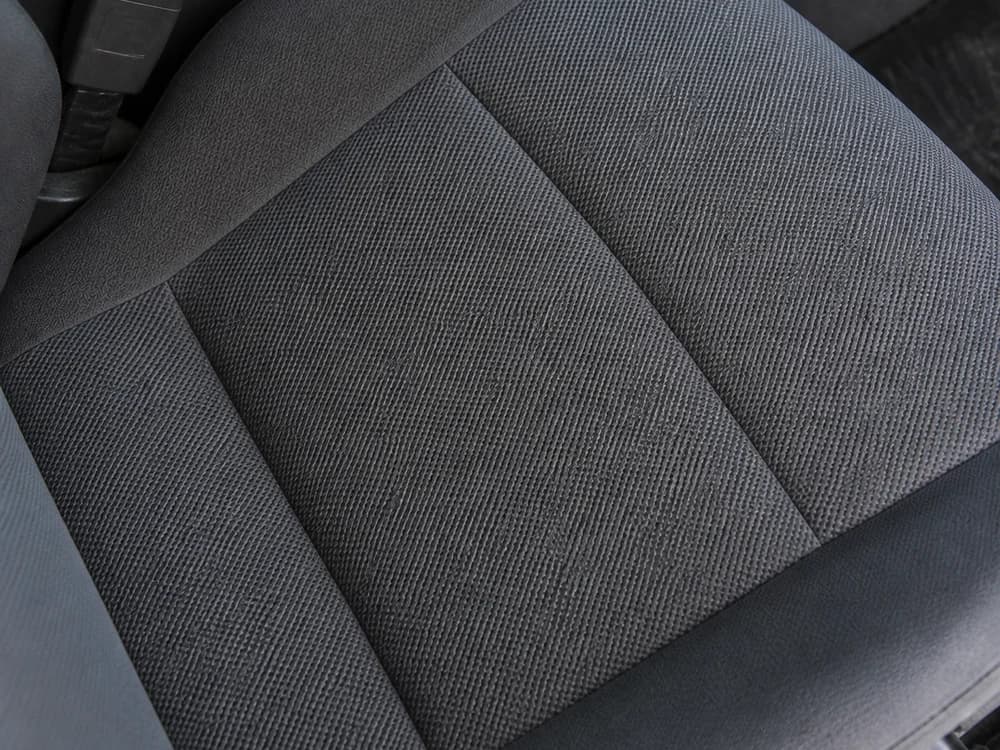 Fabric car seat after extraction cleaning