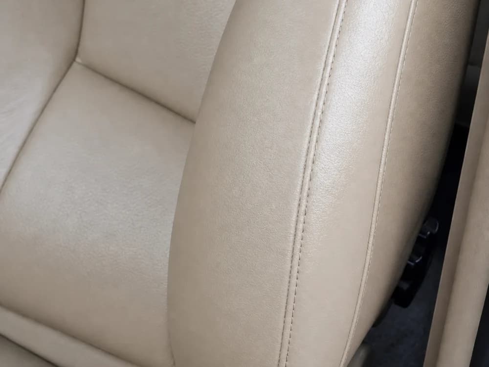 Leather car seat conditioned and restored