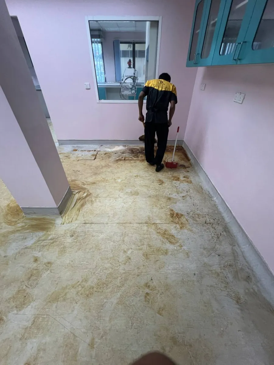 Floor coated in renovation dust and residue