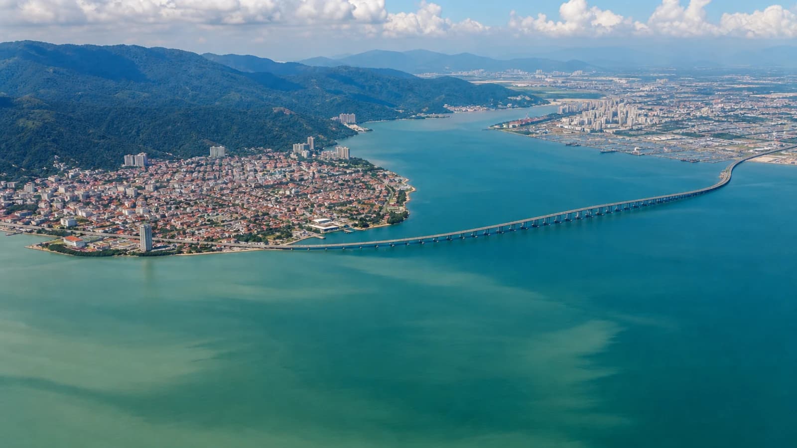 Aerial view of Penang Island and the Penang Bridge connecting to mainland Penang, the area Yellowbee Cleaning serves