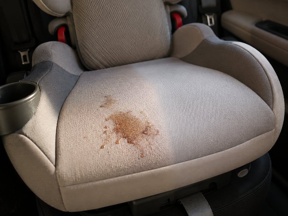 Child seat with juice & food spills