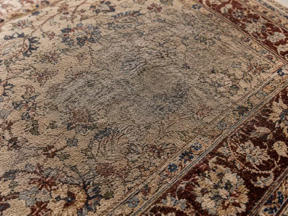 Heavily soiled Persian rug
